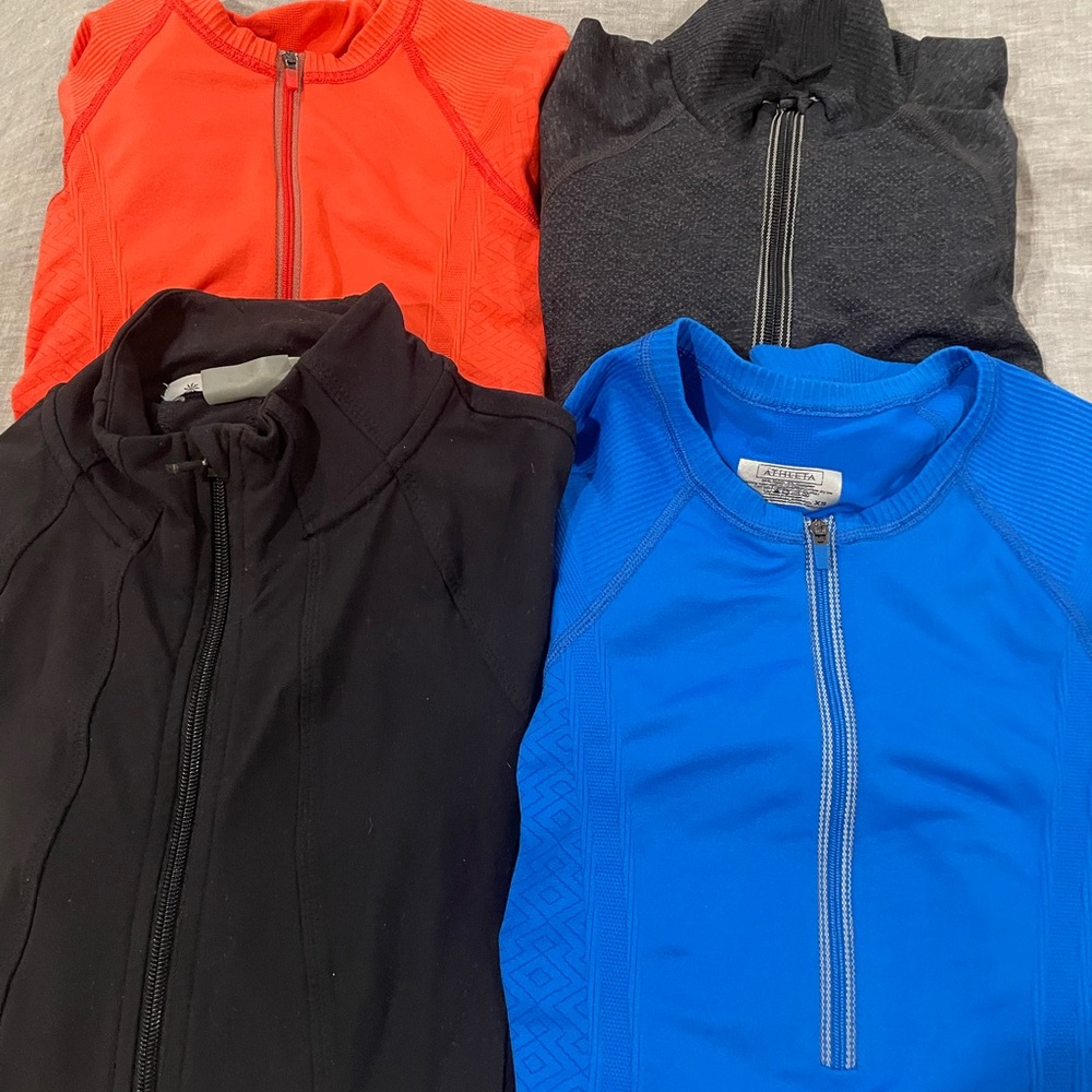 One zip up jacket(black) and 3 quarter zips, (gray orange and blue) x-small.